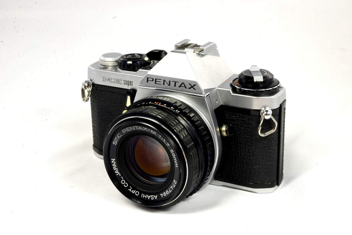 Pentax ME Super front view showing compact body and classic controls for easy film shooting.