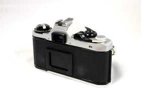 Pentax ME Super shutter dial detail emphasizing precise manual control.