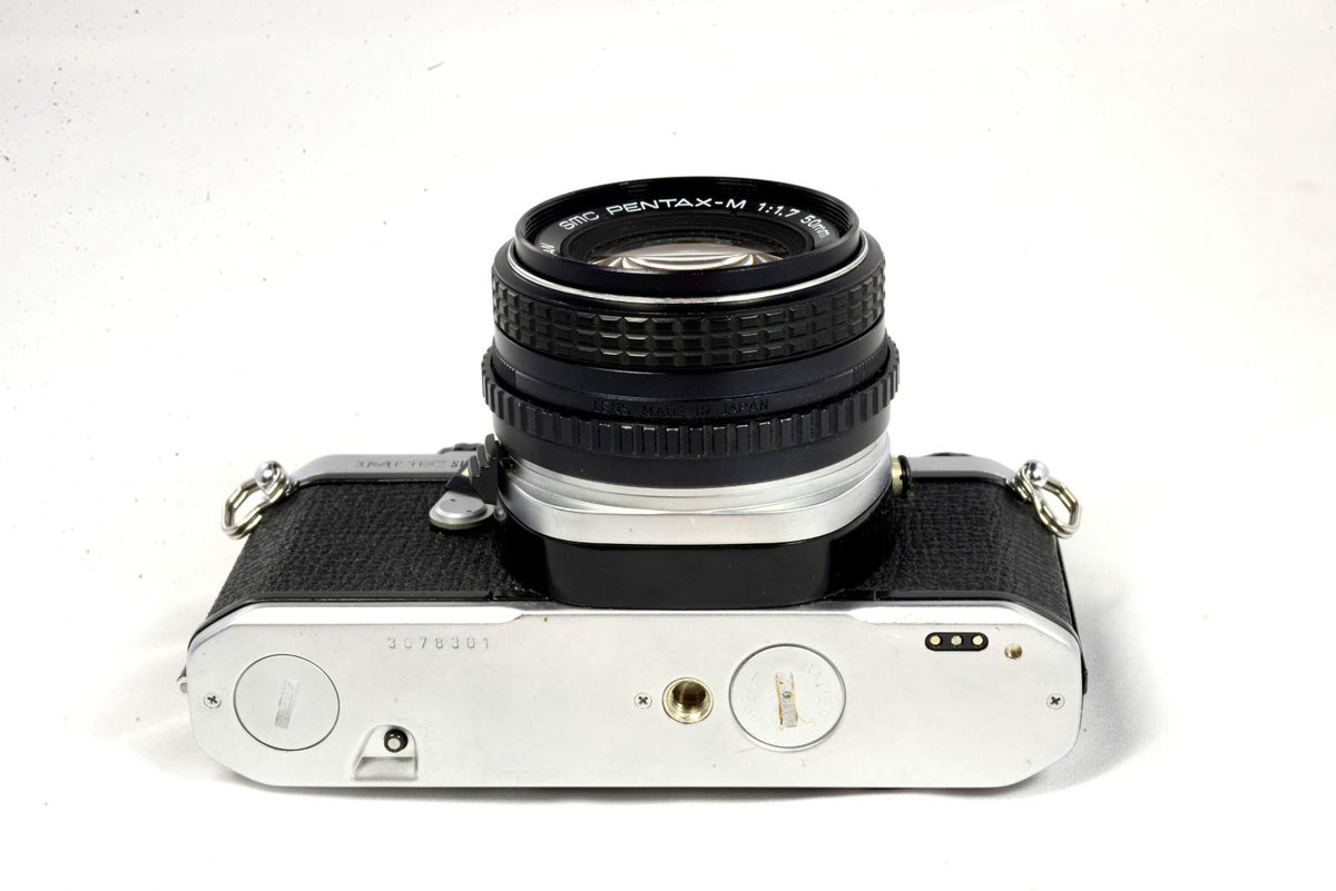 Pentax ME Super street portrait setup in action, illustrating versatile film photography.