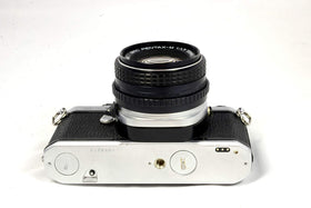 Pentax ME Super street portrait setup in action, illustrating versatile film photography.