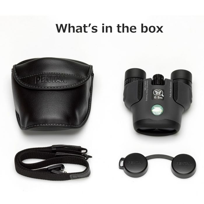 Pentax Papilio II included case, neck strap, and lens caps for protection.