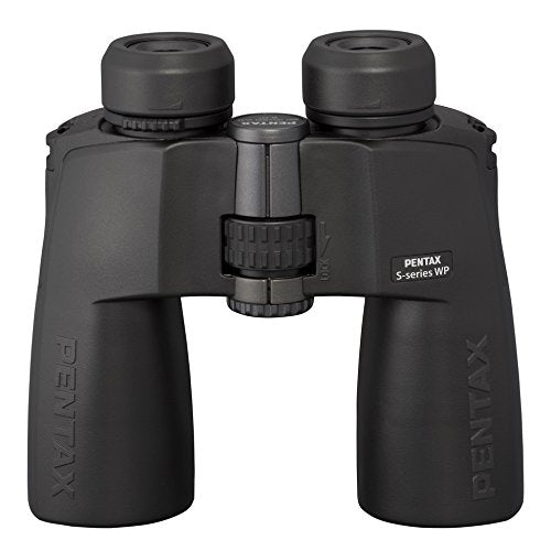 Pentax SP 10x50 WP binoculars in hand during birdwatching offering clear distant views.