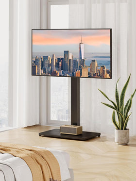 Perlegear lifestyle living room setup showing stylish freestanding TV solution