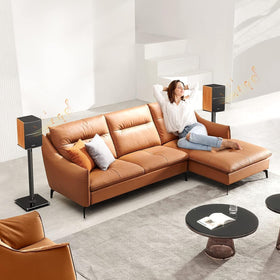 Perlegear stand side view highlights 27.5-inch height for optimal sofa listening