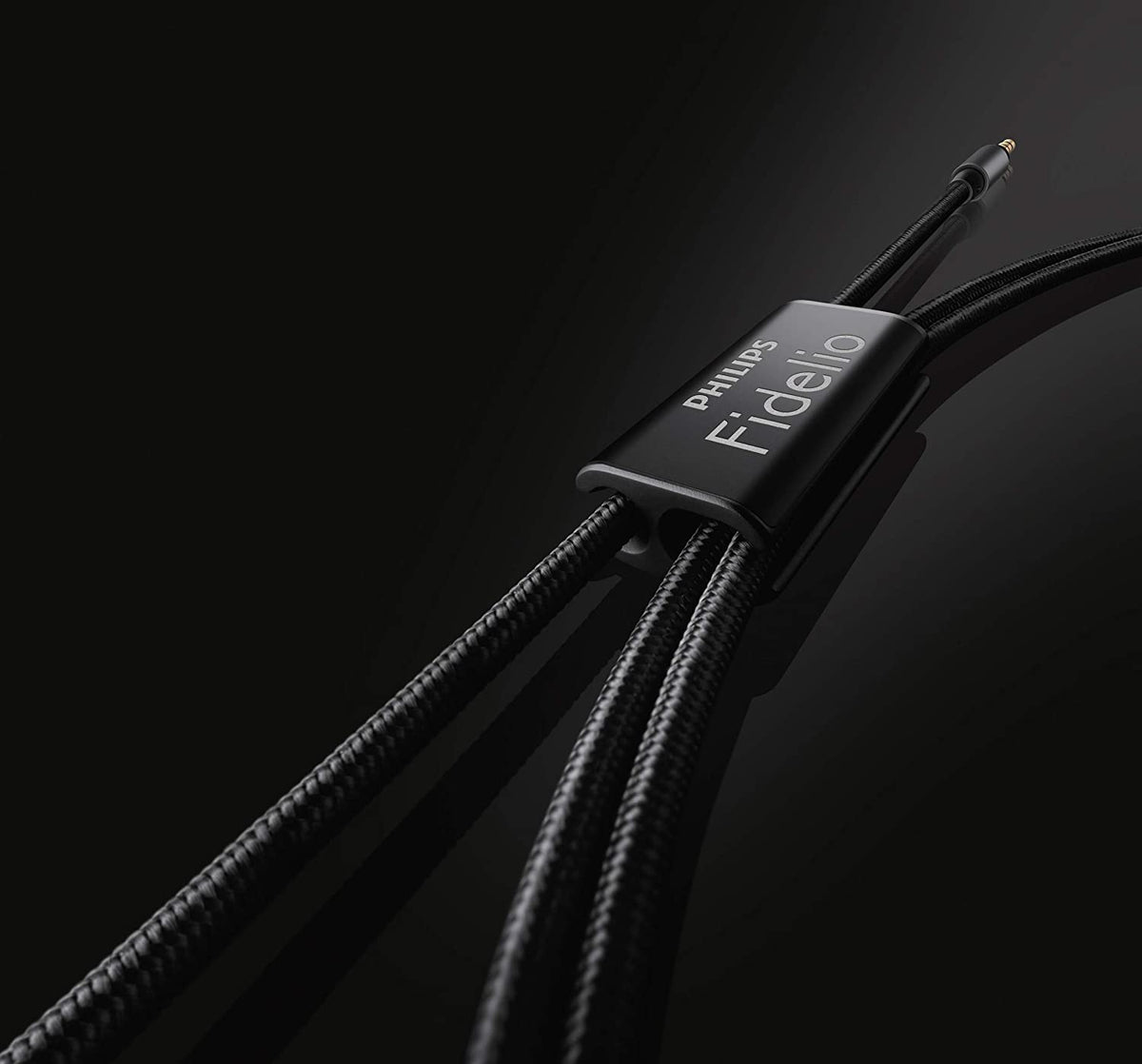 Philips Fidelio X2HR open-back grill visible for airy soundstage.