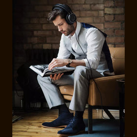 Philips Fidelio X2HR side view shows comfortable over-ear fit for long sessions.