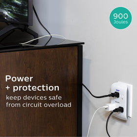 Philips in use powering bedside lamp and phone for convenient bedside charging