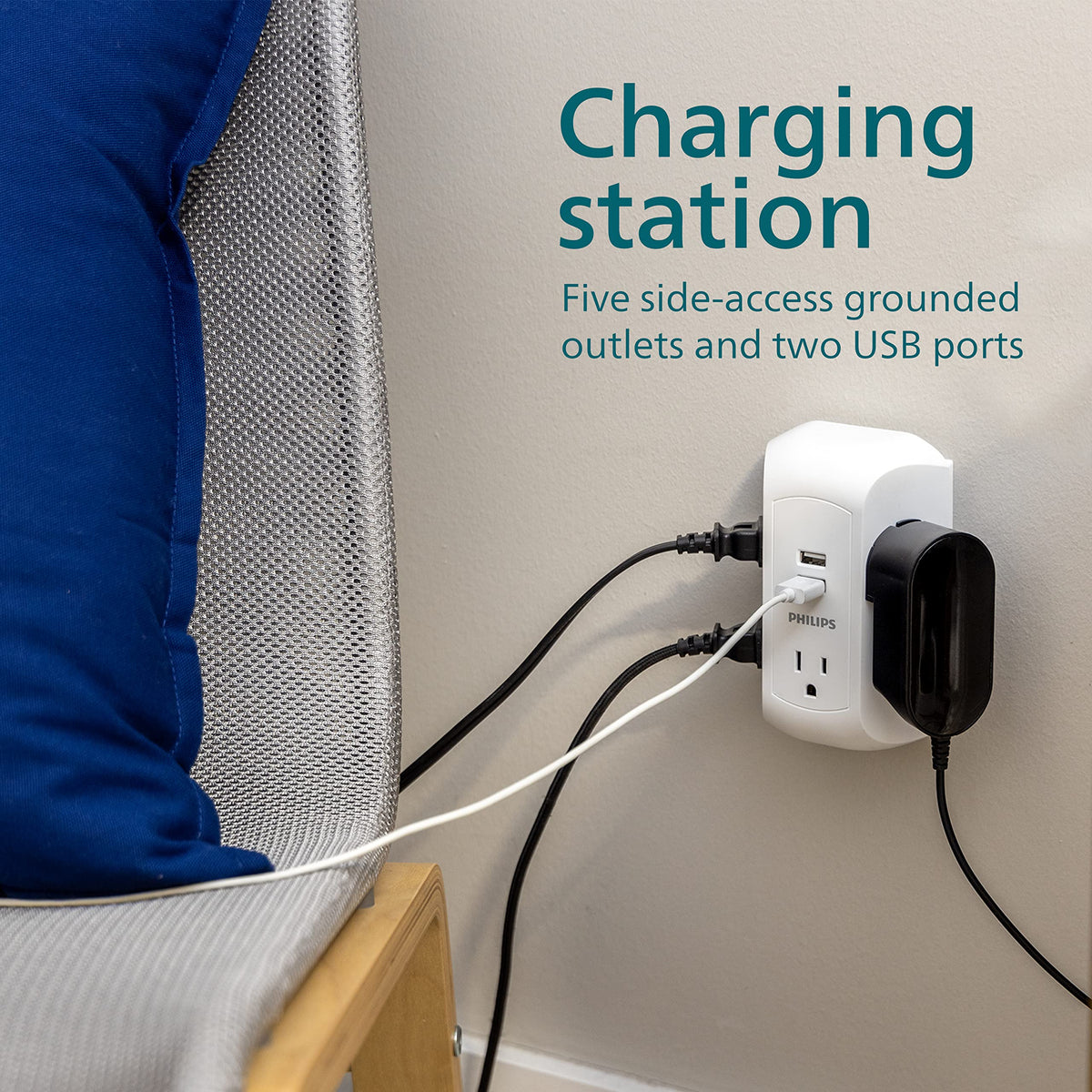 Philips in use behind TV demonstrating tidy cable management and surge protection