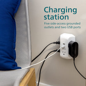 Philips in use behind TV demonstrating tidy cable management and surge protection