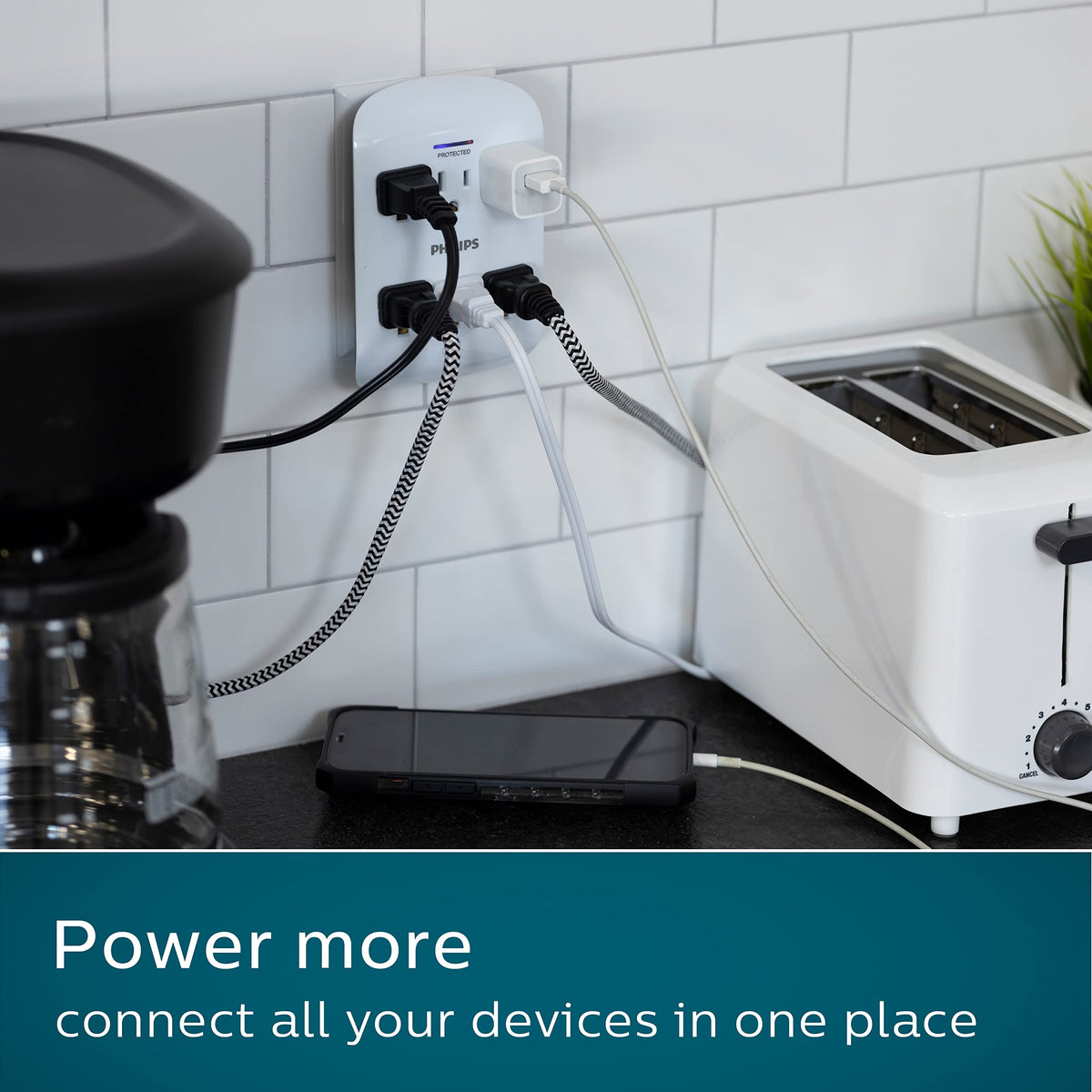 Philips size comparison against standard outlet showing compact wall tap footprint