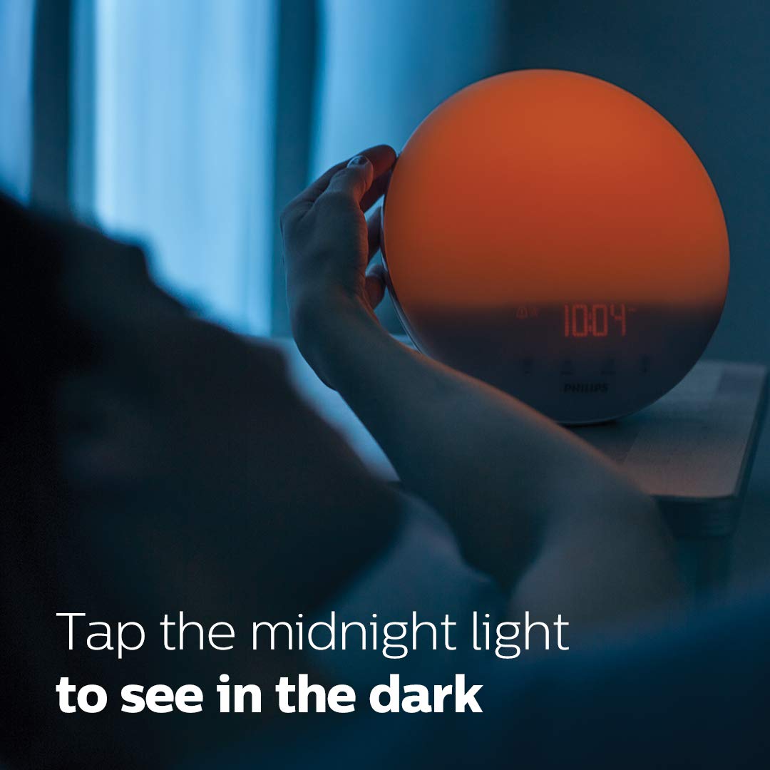 Philips SmartSleep round bedside light design for discreet placement.