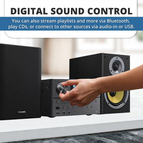 Philips stereo digital display shows source, track, and artist info at a glance.