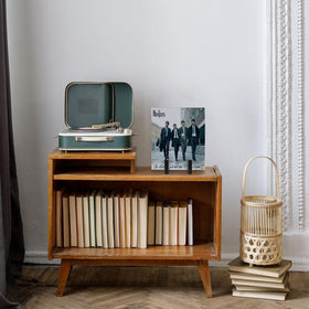 Multi-use display idea shows the organizer as decor on a bookshelf or desk.