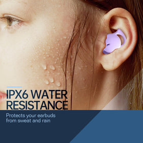 Piegricdiat earbuds beside a coin showing compact size for discreet wear