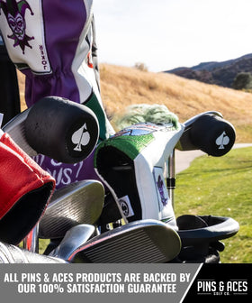 Pins & Aces speaker beside a golf ball showing compact size and portability benefit