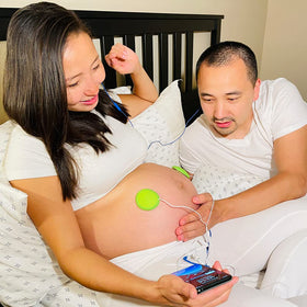 Pixie Tunes in a bedroom lifestyle setting creating calm prenatal moments