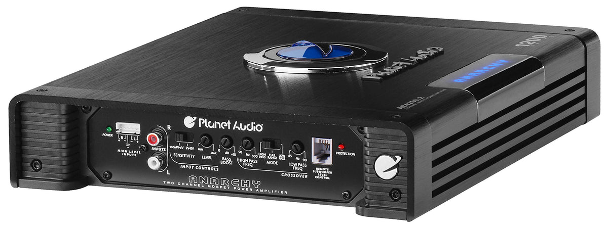 Planet Audio AC1200.2 installed under a car seat demonstrating space-saving advantage