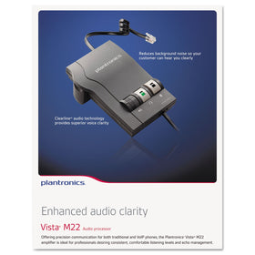 Plantronics M22 connected between phone handset and headset in office demonstrating compatibility