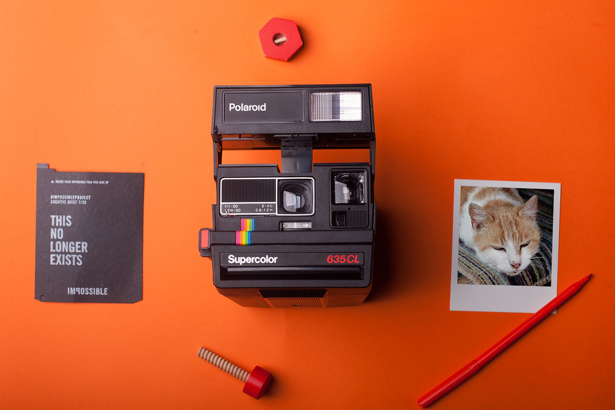 635 CL ejects a photo instantly after each shot for immediate sharing.