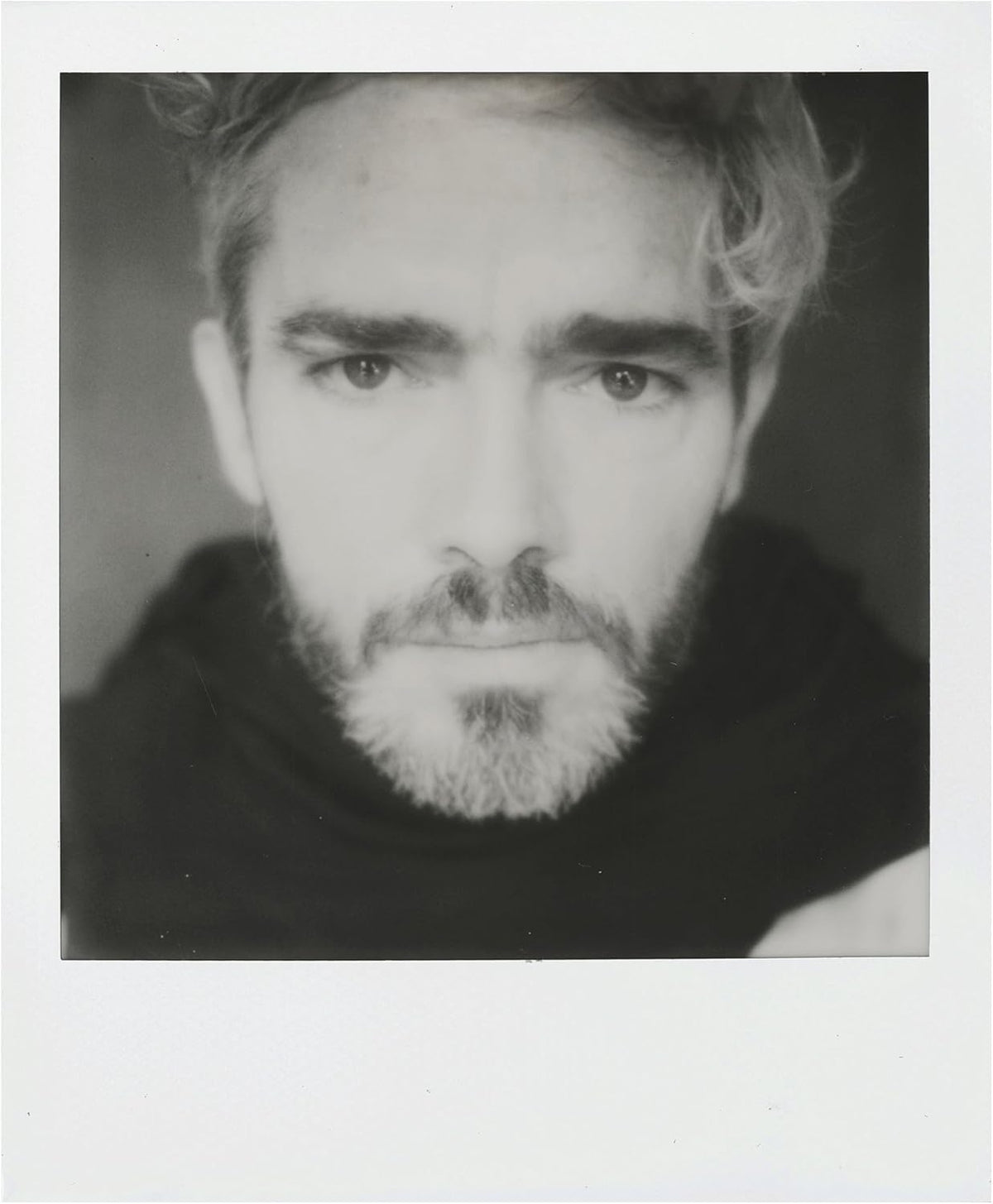 The Imaging World polaroid black & white next to ruler showing 3.1x3.1 inch image size clarity