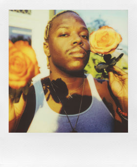 Polaroid Flip hyperfocal 4-lens system demonstrates versatile focus for portraits and street scenes.