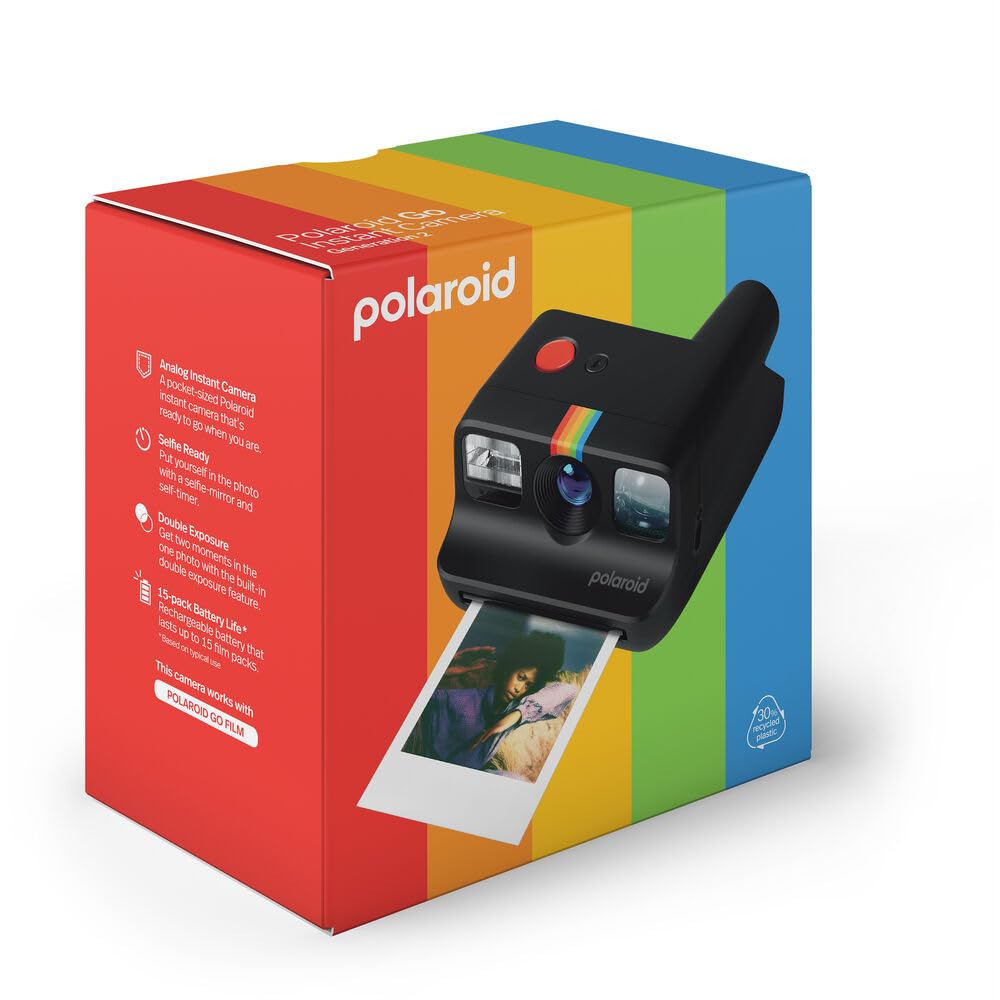 Polaroid Go lens cleaning cloth and wrist strap laid out for maintenance — Polaroid reliable upkeep