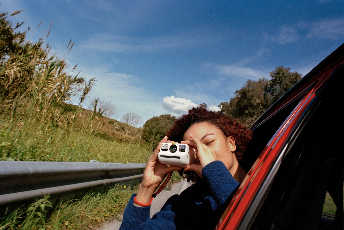 Polaroid Go film bundle included with 16 photos for instant printing.