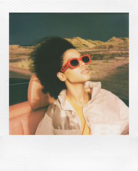 Polaroid Go Gen 2 worn in a pocket for everyday moments