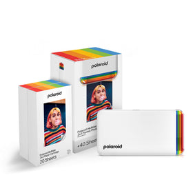 Polaroid Hi-Print bundle printer with smartphone ready for quick, vibrant 2x3 prints.