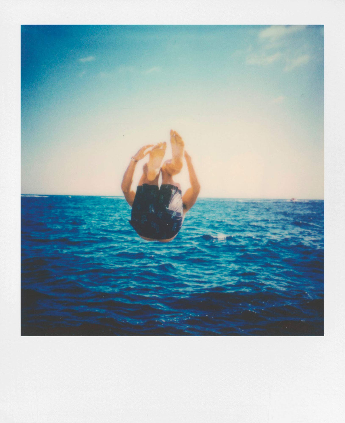 Polaroid Lab 3-element lens system turns digital shots into analog prints.