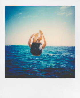 Polaroid Lab 3-element lens system turns digital shots into analog prints.