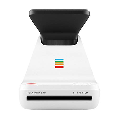 Close-up of the Polaroid Lab three-element lens system showing precision optics