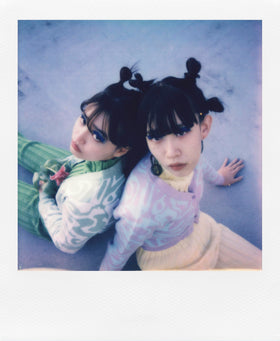 Polaroid Now+ 3rd Gen back white view emphasizing compact body and portable style.