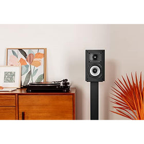 Polk Monitor XT15 woofer detail shows punchy bass for engaging movie scenes