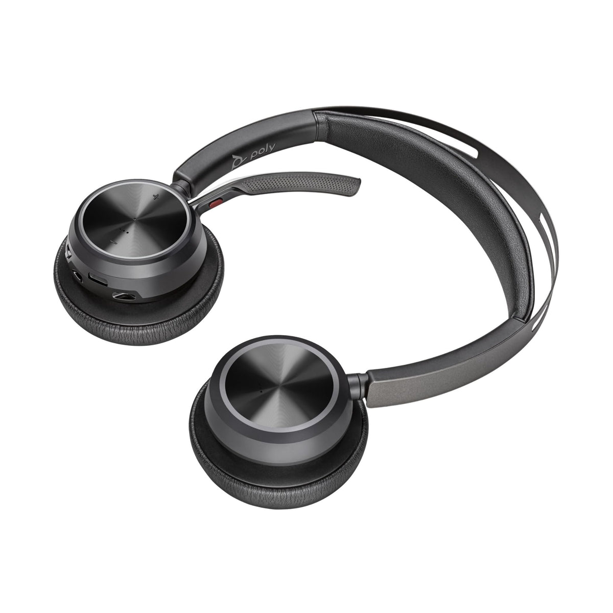 POLY Voyager Focus 2 headset beside charging stand for easy daily recharges