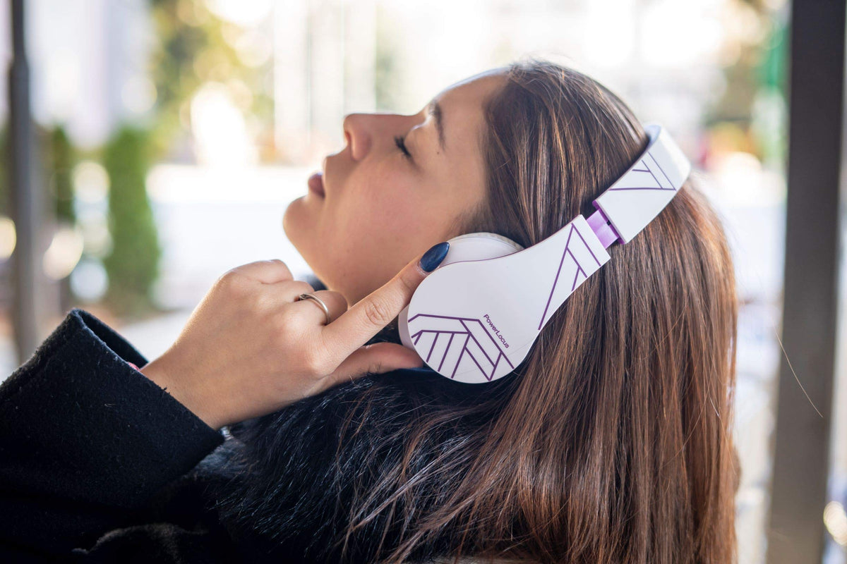 PowerLocus next to smartphone showing size and real-world scale