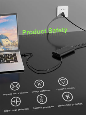 PowerPortnerLink 165W beside laptop for size comparison showing compact footprint benefit