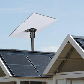 PowGrow mounted on balcony rail demonstrating space-saving pole installation benefit