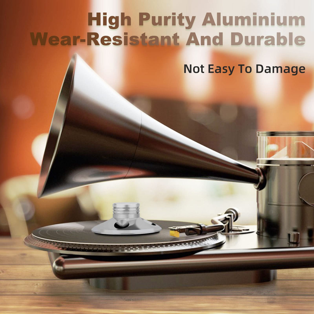 Protective soft pad cushions the record surface for gentle stabilization.