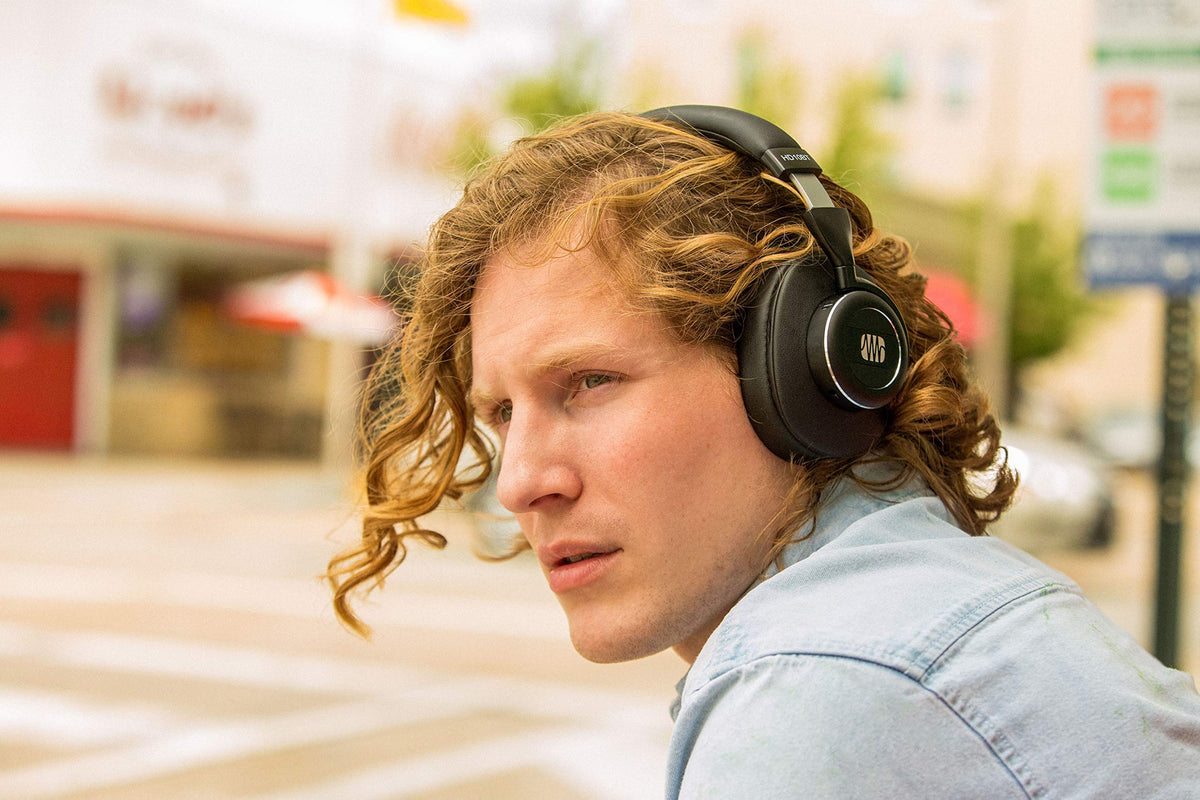 Thick ear cushions enhance comfort and passive isolation for long sessions.