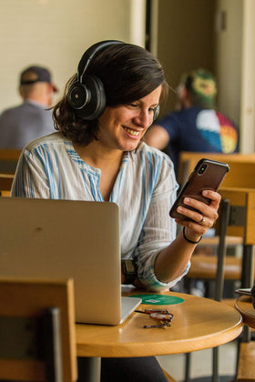Compact design supports easy on-the-go listening and quick controls.