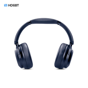 PreSonus Eris HD6BT next to smartphone illustrating compact scale and wireless convenience