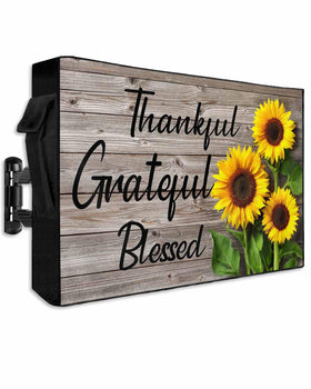 PRINT PICTURE ARTHOME front view showing fitted sunflower plank cover protecting TV outdoors