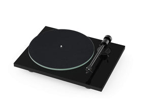 Pro-Ject T1 Evo dust cover open, highlighting easy access and protective enclosure during sessions.