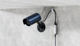 PROCET PT-PR01G installed on an outdoor pole protecting cameras and wireless radios from surges