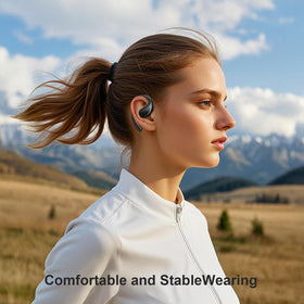 Psadhi earbuds beside a coin to show scale and lightweight comfort