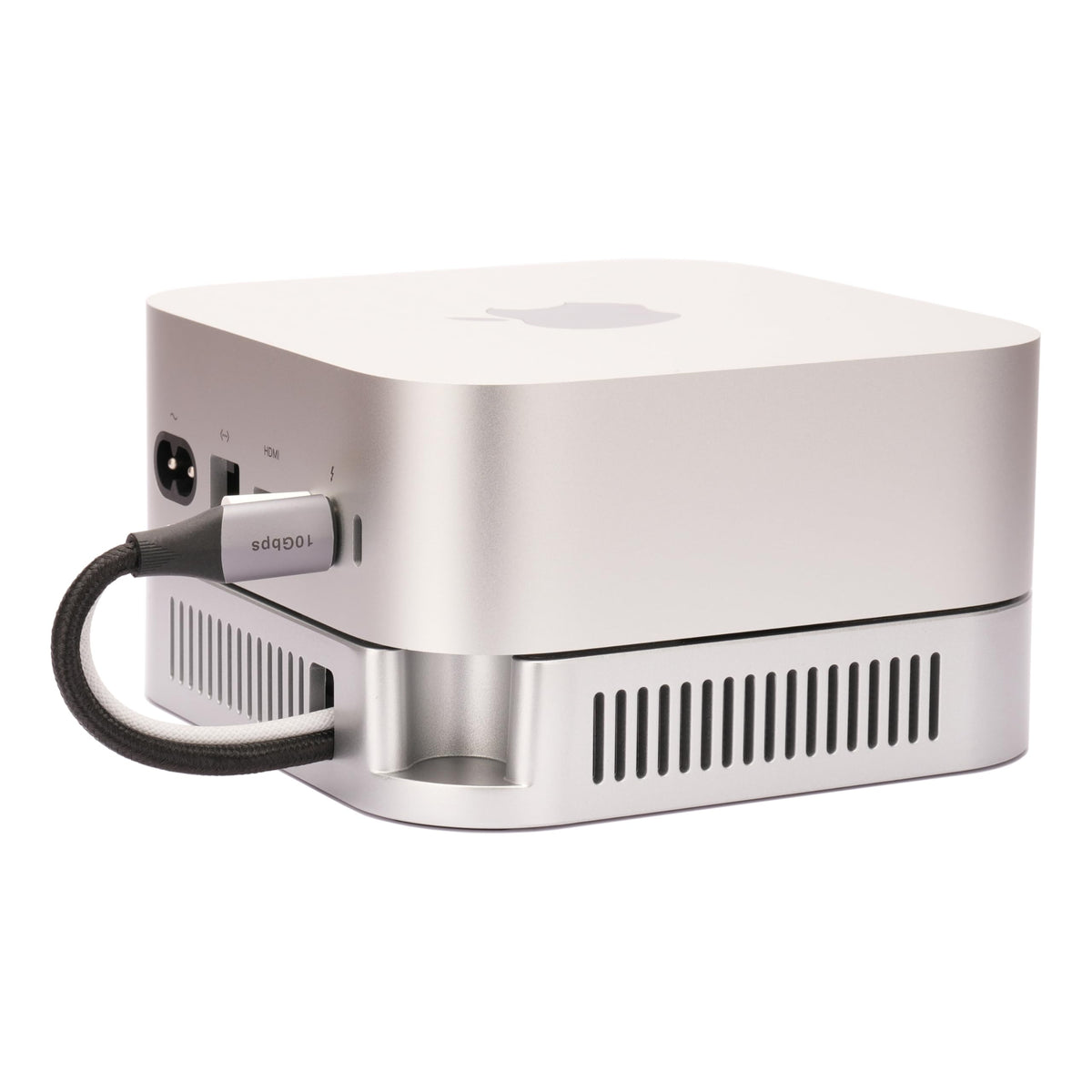 Psitek stand under Mac mini on desk for organized workspace benefit