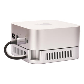 Psitek stand under Mac mini on desk for organized workspace benefit