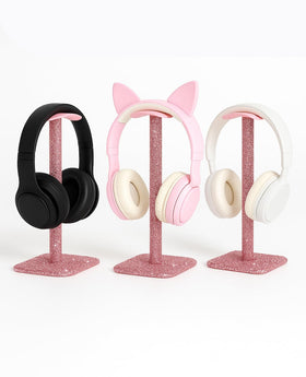 Headphone desk organization helps cables stay tidy and within reach.