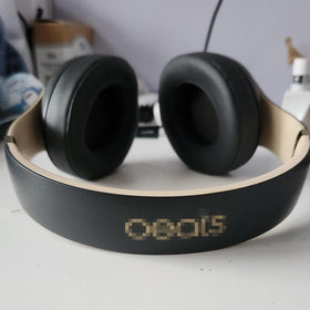 Pumyog replacement headband on desk showing renewed headphone style